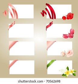 Set of blank white cards with ribbons and flowers