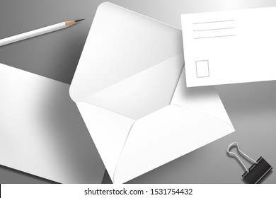Set of blank white postcard, envelope,  pencil and binder. Mockup template with shadow 