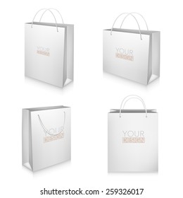 Set of blank white shopping bags isolated on white background