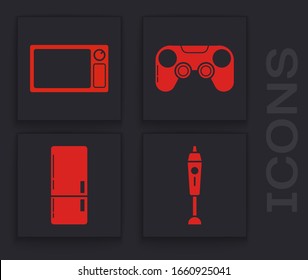 Set Blender , Microwave oven , Gamepad  and Refrigerator  icon. Vector