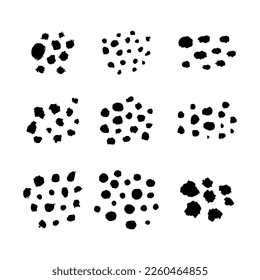 Set of blots. Black spots of paint on a white background. Grunge frame of paint. Vector