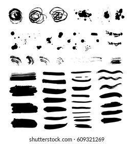 A set of blots, strips and scribbles ink.