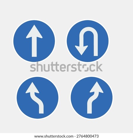 Set of blue circular traffic direction icons with arrows indicating straight, turn, and U-turn directions for navigation and road signs.
