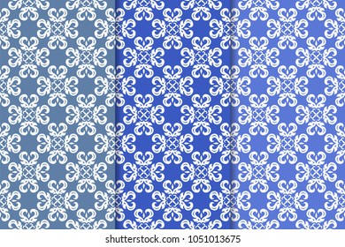 Set of blue floral ornamental designs. Vertical seamless patterns for wallpapers and fabrics