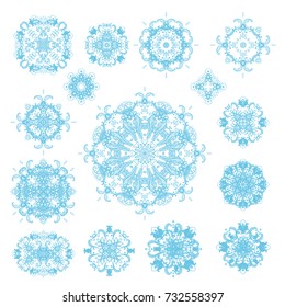 Set of blue laced decorative vector rosettes on white background