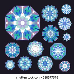 Set of blue, turquoise and violet polygonal geometric flowers or snowflakes on almost black, in vector