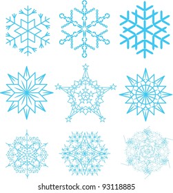 A set of blue vector snowflakes and stars with different symmetry