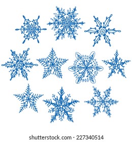 Set blue winter snowflakes on white background. Vector