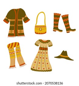 Set of boho clothes. Collection of things. Coat, dress and scarf, boots, hat and bag. Trendy outfits. Warm and cozy bohemian look. Scandinavian print. Colorful hand drawn vector illustration isolated