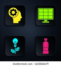 Set Bottle of water, Human head with gear inside, Light bulb with leaf and Solar energy panel. Black square button. Vector