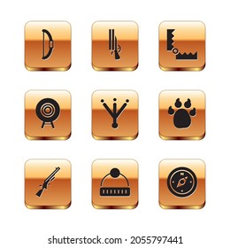 Set Bow, Shotgun, sombrero de invierno, huella de pájaro, deporte objetivo, caza de trampas, brújula e icono. Vector