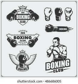 Set of boxing club labels, emblems, badges, icons and design elements. Vintage style. Monochrome illustration.