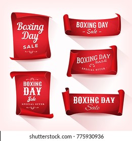 Set of Boxing Day Sale Parchment And Banners/
Illustration of a set of elegant design christmas and boxing day on red parchment scroll, for december and winter holiday sale