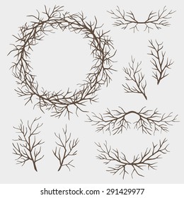 Set of branches, without leaves. The branches in the form of a wreath and other elements of decor. Gray background.