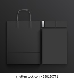 Set of branding elements on black background. Mockup