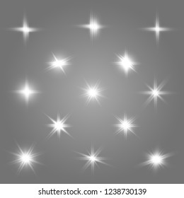 Set of bright beautiful stars. Light effect Bright Star. Beautiful light for illustration. Christmas star. Vector sparkles on transparent background.White glowing light