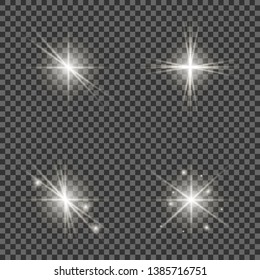 A set of bright beautiful stars. Light effect. Bright Star. Beautiful light for illustration. Christmas star.White sparkles shine special light effect. Vector sparkles on a transparent background. 