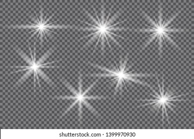 A set of bright beautiful stars. Light effect. Bright Star. Beautiful light for illustration. Christmas star.White sparkles shine special light effect. Vector sparkles on a transparent background. 