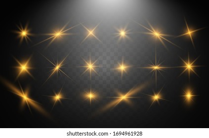 A set of bright beautiful stars. Light effect. Bright Star. Beautiful light for illustration. Christmas star.White sparkles shine special light effect. Vector sparkles on a transparent background.	