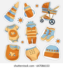 Set of bright colored sticker style baby items on light background