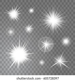 Set of bright glowing light suns burst on transparent background. Glitter stars effect decoration with ray sparkles for your design. Vector illustration