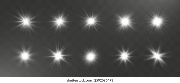 Set of bright light sparkle effects, glowing stars on dark background, shining glitter elements, magical illumination, festive luminous decoration.
