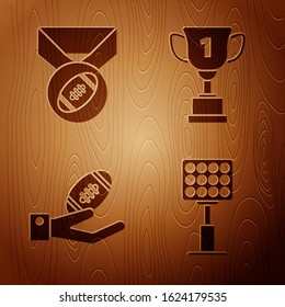 Set Bright stadium lights, American Football ball with medal, American Football ball on hand and Award cup on wooden background. Vector