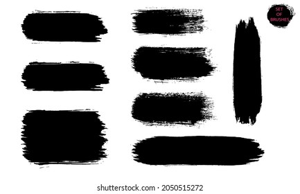 A set of broad brush strokes isolated on a white background. Vector set of brush strokes of different textures for design. 