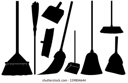 set of brooms and dustpans