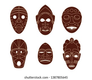 Set of brown flat African tribal ethnic masks on white background. Vector illustration