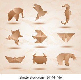 Set of brown origami animals elephant, bird, sea horse, fish, butterfly, bear, crab, fish