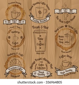 Set of brown vintage coffee badges on wooden background vector illustration