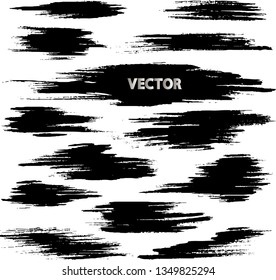 Set of brush and ink strokes. Black texture spots. Vector illustration
