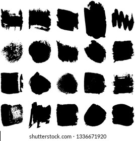 A set of brush strokes. Abstract black spots on white background