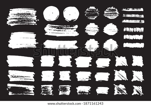 Set of brush strokes hand\
painted with black ink, isolated on white background. Vector\
illustration