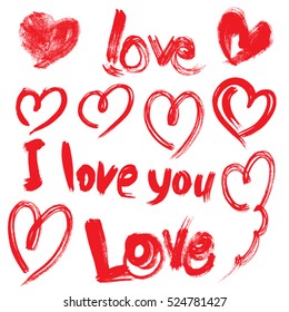 Set of brush strokes and scribbles in heart shapes and words I LOVE you, sketch elements for Valentines Day Card, invitation design. Red color image isolated on white background.