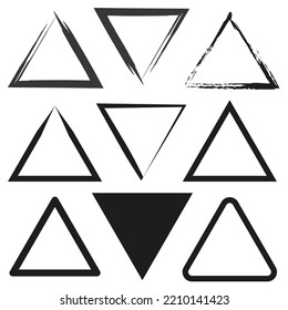 set with brush triangles. Ink paint brush stain. Design element. Vector illustration. Stock image. 