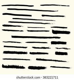 Set of brushes, black on white background, vector