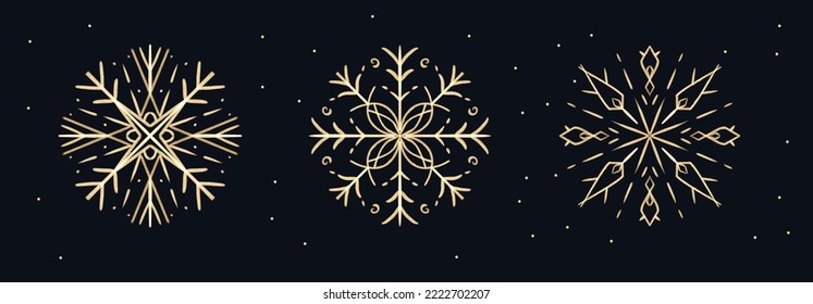 Juego de pinceles dibujado a mano Copos de nieve de oro para el diseño navideño. Elementos aislados de vacaciones de invierno