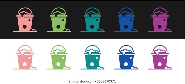 Ajuste Cubo con el icono de espuma y burbujas aislado sobre fondo blanco y negro. El concepto de servicio de limpieza.  Vector