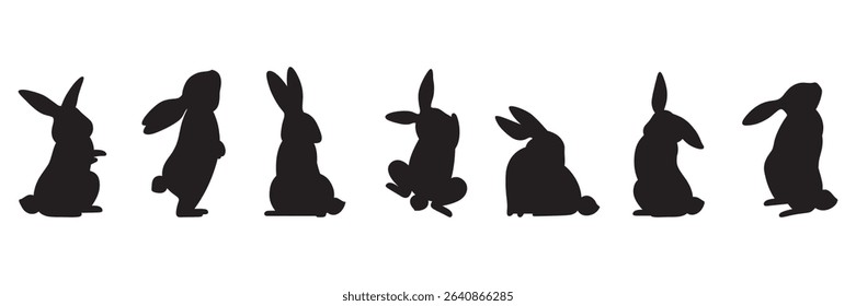 Set of bunny silhouettes in various sitting and crouching poses