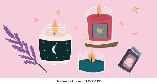 a set of burning candles in a magical design. Candles in jars with the theme of magic, mysticism, stars. Matches in a box with magical decor.