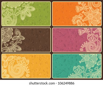 Set of business cards with abstract floral pattern and grunge background in bright colors