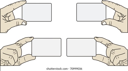 set of business cards in hands