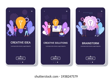 set businesspeople holding bright bulb successful teamwork creative solutions big idea brainstorm concept mix race men women coworkers brainstorming smartphone screens collection full length