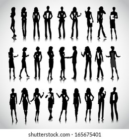 Set of businesswoman silhouettes on the background