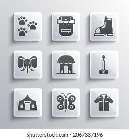 Set Butterfly, Shirt, Arrow, African hut, Tourist tent, Elephant, Paw print and Hunter boots icon. Vector