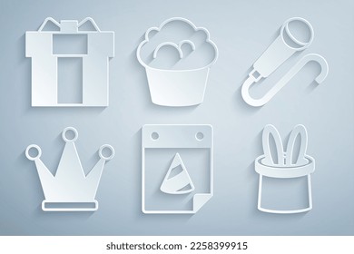 Set Calendar party, Microphone, Crown, Magician hat and rabbit ears, Muffin and Gift box icon. Vector