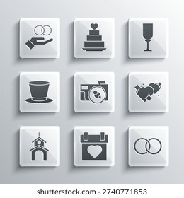 Set Calendar, Wedding rings, Two Linked Hearts, Photo camera, Church building, Cylinder hat,  and Glass of champagne icon. Vector