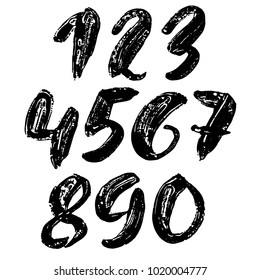 Set of calligraphic ink numbers. Textured brush lettering. Vector illustration.